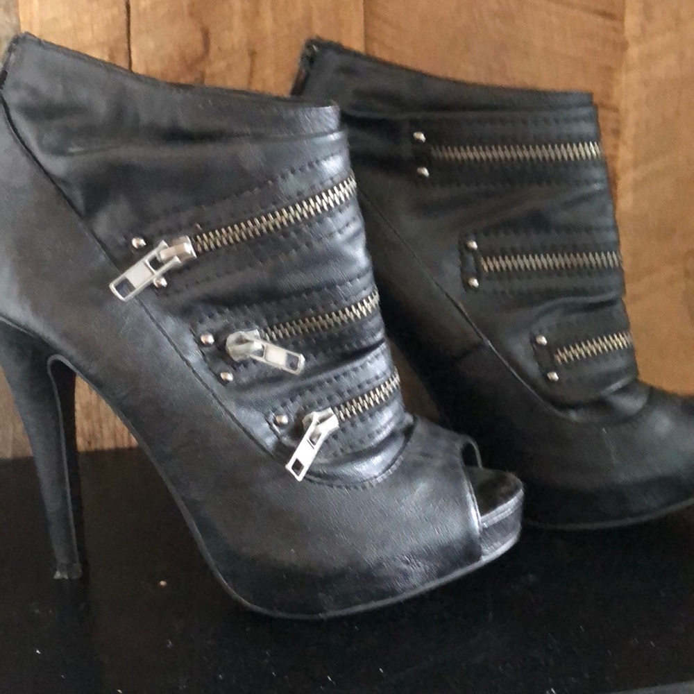 Black zip high heels